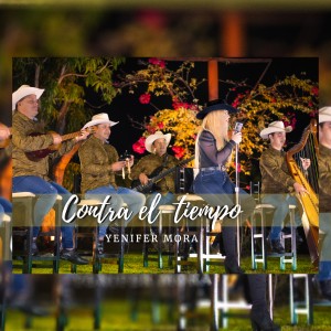 Dengarkan Contra el Tiempo lagu dari Yenifer Mora dengan lirik