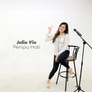 Listen to Penipu Hati song with lyrics from Julia Vio