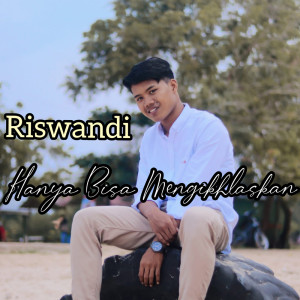 Listen to Hanya Bisa Mengikhlaskan song with lyrics from Riswandi