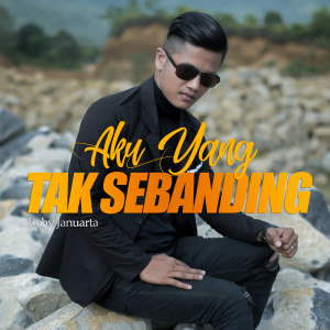 ดาวน์โหลดและฟังเพลง Aku Yang Tak Sebanding พร้อมเนื้อเพลงจาก Roby Januarta
