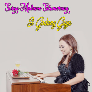 Dengarkan lagu Si Godang Gaya nyanyian Surya Madame Situmorang dengan lirik