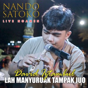 Dengarkan LAH MANYURUAK TAMPAK JUO (Live) lagu dari Nando Satoko dengan lirik