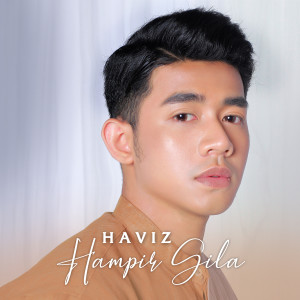 Dengarkan Hampir Gila lagu dari HAVIZ dengan lirik