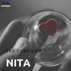 Dengarkan lagu Tak Punya Hati nyanyian Nita dengan lirik