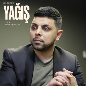 Dengarkan lagu Yağış (Iki Sirdaş) nyanyian Zaur Əmiraslanov dengan lirik