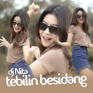 Dengarkan Tebilin Besidang lagu dari DJ Nita dengan lirik