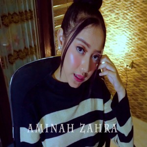 Listen to Putus song with lyrics from Aminah Zahra