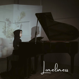 Listen to Loneliness song with lyrics from Putri Ariani