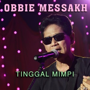 ดาวน์โหลดและฟังเพลง Tinggal Mimpi พร้อมเนื้อเพลงจาก Obbie Mesakh