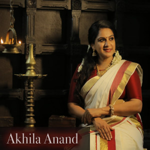 收听Akhila Anand的Poothiruvonam歌词歌曲