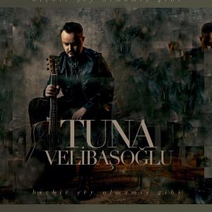 收聽Tuna Velibaşoğlu的Hiçbir şey olmamış gibi...歌詞歌曲