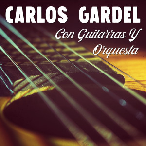 Dengarkan lagu Volvió una Noche nyanyian Carlos Gardel dengan lirik