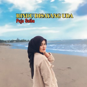 Listen to RINDU DISAYANG UDA song with lyrics from Puja Saiba