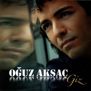 Listen to Yüce Dağ Başında Yanar Bir Işık song with lyrics from Oguz Aksaç