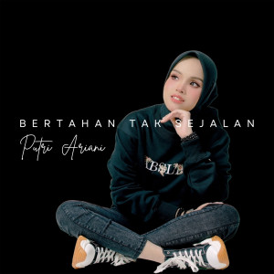 Listen to Bertahan Tak Sejalan song with lyrics from Putri Ariani
