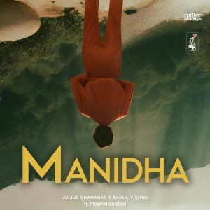 Listen to Manidha song with lyrics from Julius Gnanagar