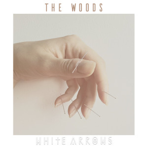 Dengarkan The Woods lagu dari White Arrows dengan lirik