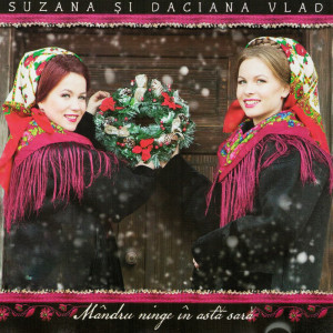 Dengarkan lagu Ne Amintim De Sarbatori nyanyian Suzana și Daciana Vlad dengan lirik