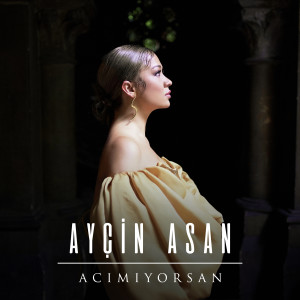 Dengarkan lagu Acımıyorsan nyanyian Ayçin Asan dengan lirik