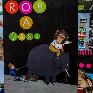 Dengarkan Rob A Bank (Explicit) lagu dari Confetti dengan lirik