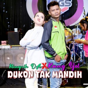 Listen to Dukon Tak Mandih song with lyrics from Ningsih Da
