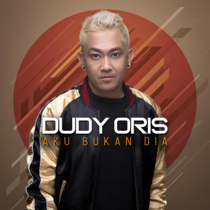 收听Dudy Oris的Aku Bukan Dia (Band Version)歌词歌曲