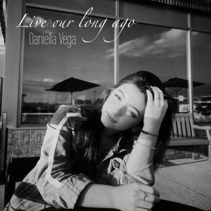 Dengarkan lagu Live Our Long Ago nyanyian Daniella Vega dengan lirik