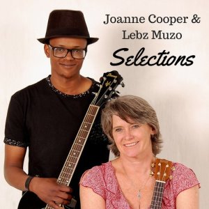 ดาวน์โหลดและฟังเพลง Leaving on a Jet Plane พร้อมเนื้อเพลงจาก Joanne Cooper