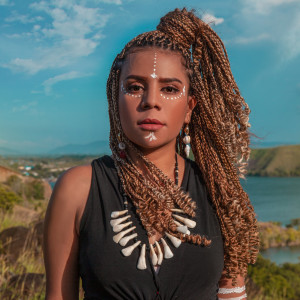 Listen to Tatinggal Di Papua song with lyrics from Nowela Mikhelia