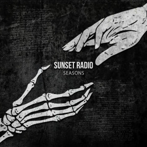 Dengarkan Strangers lagu dari Sunset Radio dengan lirik