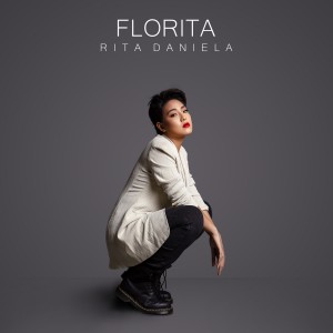 Dengarkan lagu Florita nyanyian Rita Daniela dengan lirik