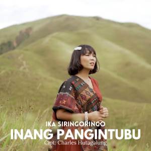 Dengarkan Inang Pangintubu lagu dari IKA SIRINGORINGO dengan lirik