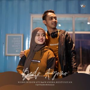 Dengarkan lagu Bedo Agomo nyanyian Woro Widowati dengan lirik