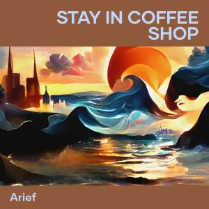 Dengarkan lagu Stay in Coffee Shop (Remastered 2023) nyanyian Arief dengan lirik
