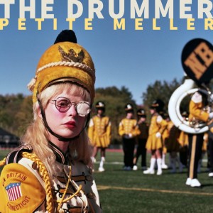 Dengarkan The Drummer lagu dari Petite Meller dengan lirik