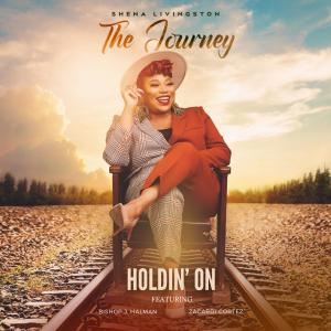 收聽Shena Livingston的Holdin' On (feat. Bishop Joe Halman & Zacardi Cortez)歌詞歌曲
