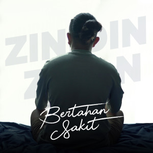 Dengarkan lagu BERTAHAN SAKIT nyanyian Zinidin Zidan dengan lirik