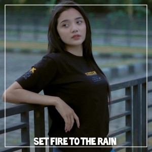 Dengarkan Set Fire to the Rain lagu dari Dj Tanti dengan lirik