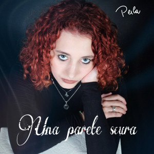 Listen to Una parete scura song with lyrics from Perla