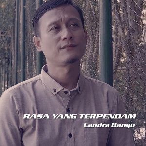 Dengarkan lagu Rasa Yang Terpendam nyanyian Candra Banyu dengan lirik