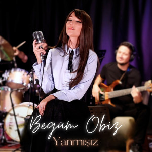 Listen to Yanmışız song with lyrics from Begüm Obiz