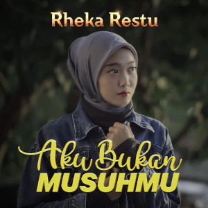 收听Rheka Restu的Aku Bukan Musuhmu歌词歌曲