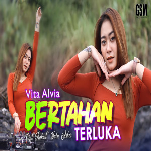 收听Vita Alvia的Bertahan Terluka歌词歌曲