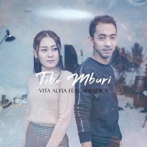 Dengarkan Tibo Mburi Feat. Wandra lagu dari Vita Alvia dengan lirik