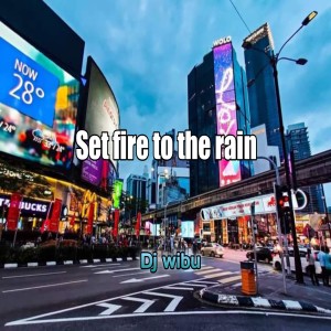 Listen to Set fire to the rain (Remix) song with lyrics from Dj Wibu