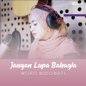 Dengarkan lagu Jangan Lupa Bahagia nyanyian Woro Widowati dengan lirik