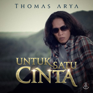 Dengarkan lagu Untuk Satu Cinta nyanyian Thomas Arya dengan lirik
