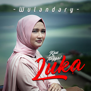 ดาวน์โหลดและฟังเพลง Kau Tinggal Luka พร้อมเนื้อเพลงจาก Wulandary