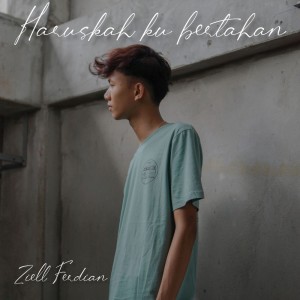 Dengarkan Haruskah Ku Bertahan lagu dari Ziell Ferdian dengan lirik