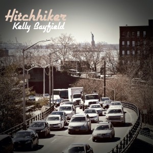 ดาวน์โหลดและฟังเพลง Hitchhiker พร้อมเนื้อเพลงจาก Kev Walford & Kelly Bayfield